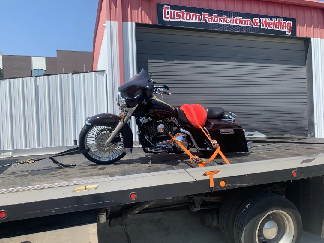 Maroon Harley — soft-strap transport