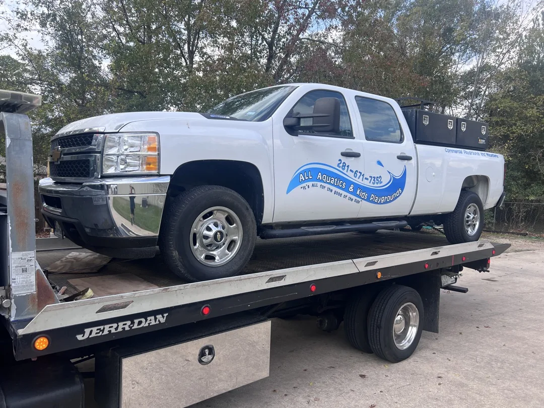 Wrapped Silverado — fleet tow